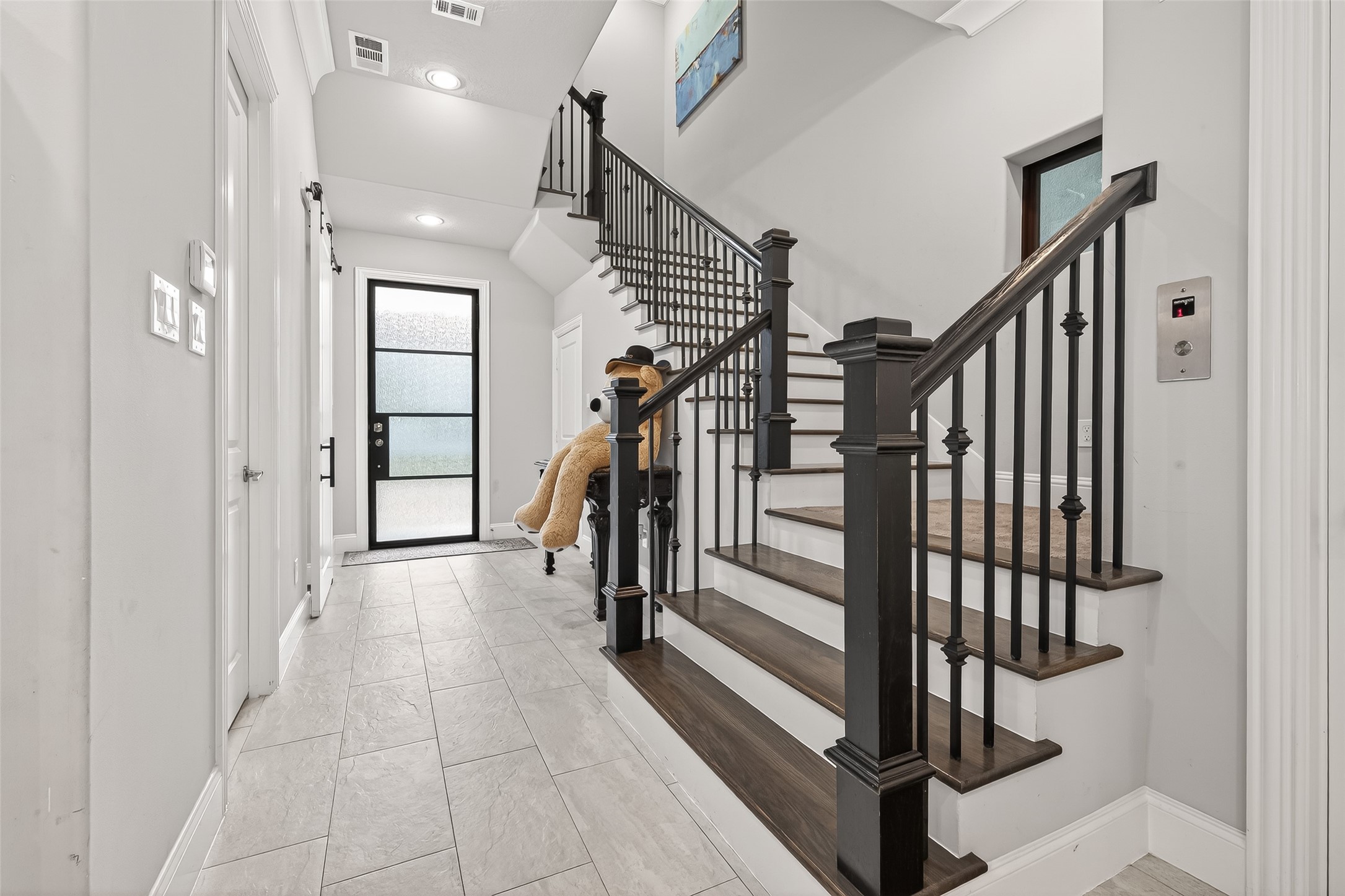 2435 Prairie Hollow Lane Houston, TX 77077 - Photo 4 of 50 a view of entryway and hall with a living room