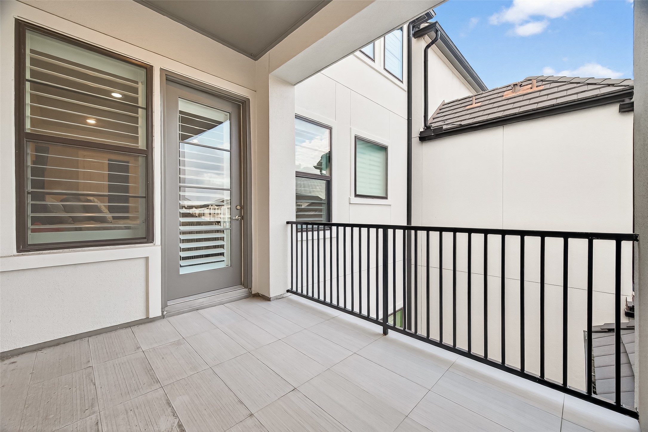 2435 Prairie Hollow Lane Houston, TX 77077 - Photo 45 of 50 a view of a porch with a door
