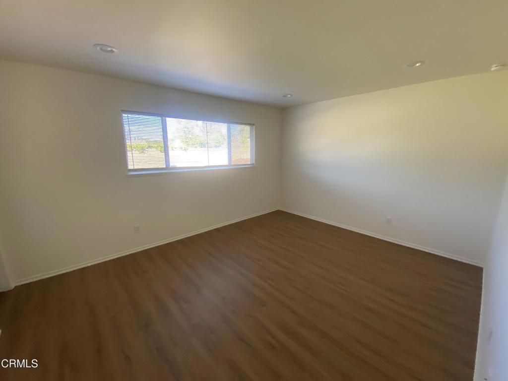 3 Venus Street Thousand Oaks, CA 91360 - Photo 15 of 27 an empty room with wooden floor and windows