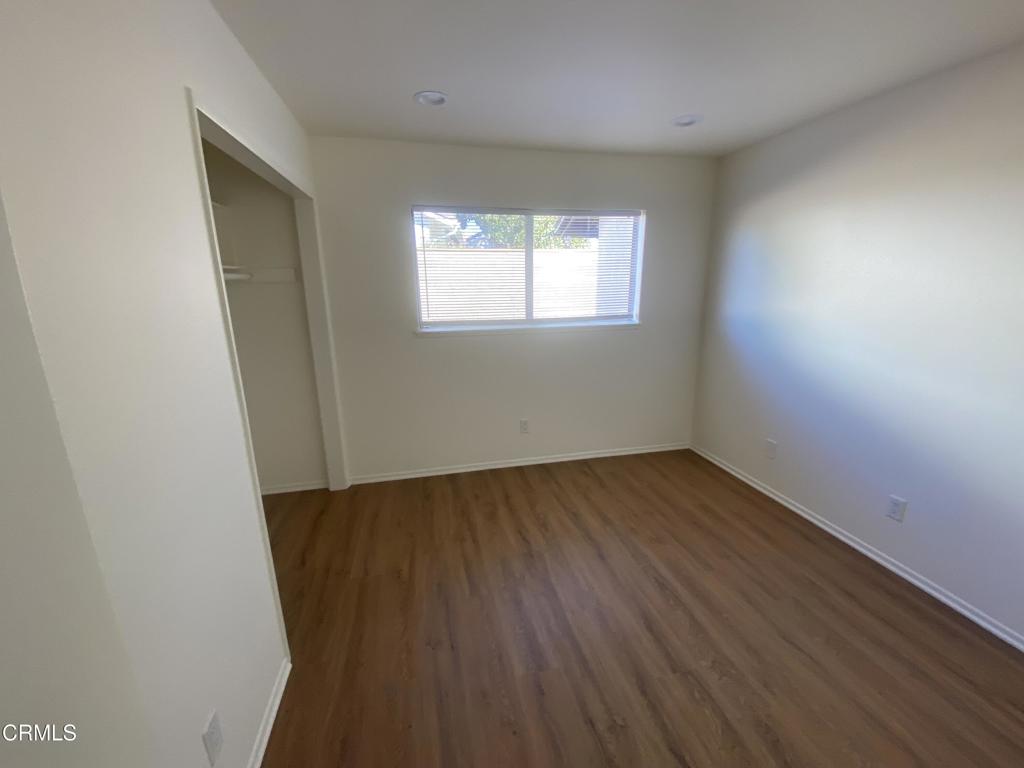 3 Venus Street Thousand Oaks, CA 91360 - Photo 17 of 27 an empty room with wooden floor and windows