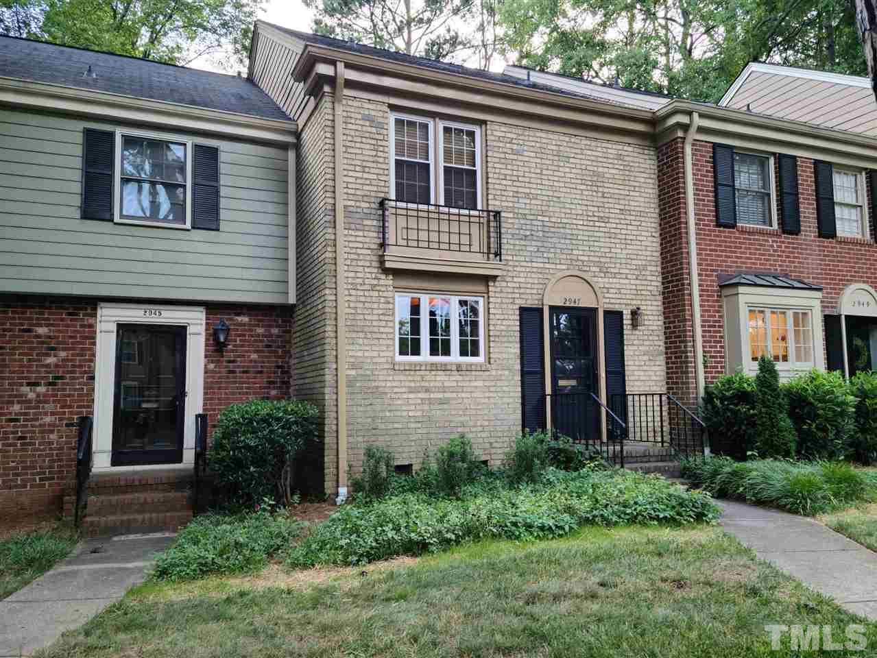 2947 Wycliff Road Raleigh, NC 27607 - Photo 2 of 11 a front view of a house with garden