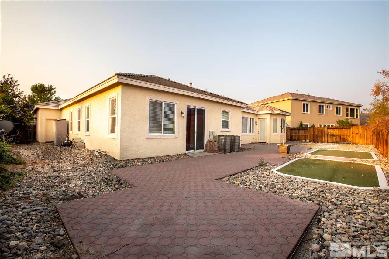 1695 Silver Thread Drive Reno, NV 89521 - Photo 13 of 15 a front view of a house with yard