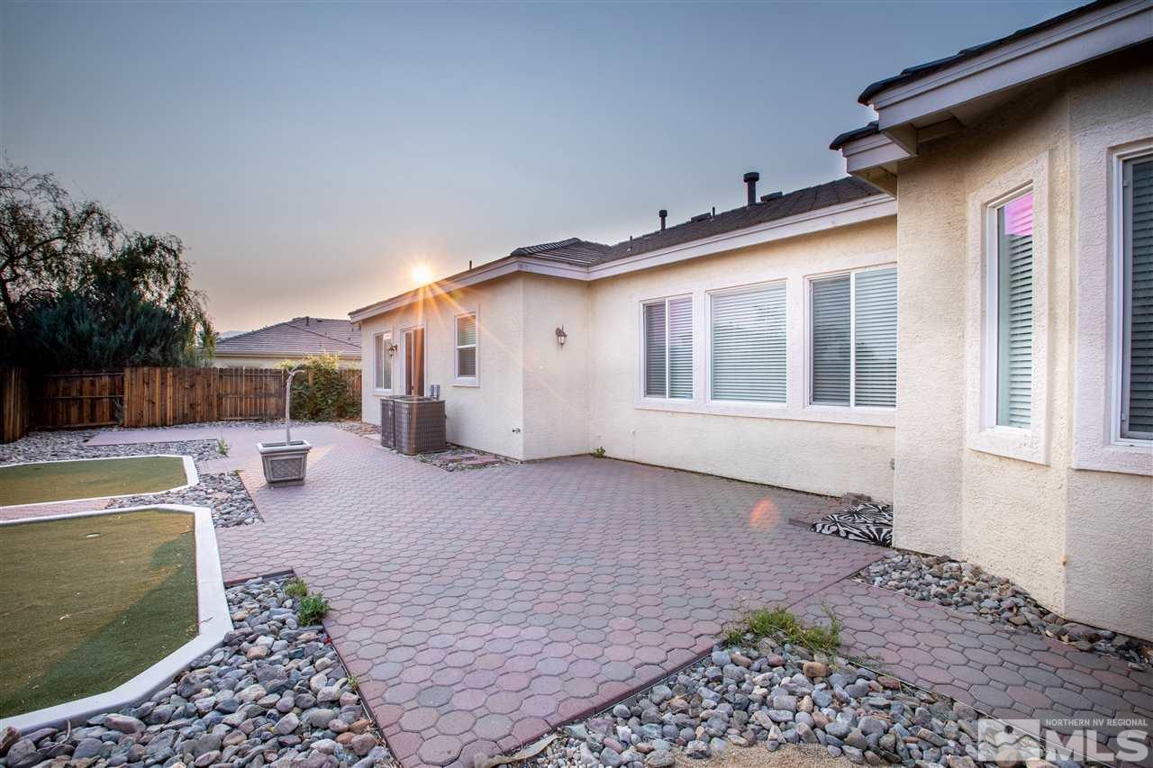 1695 Silver Thread Drive Reno, NV 89521 - Photo 14 of 15 a view of a house with backyard and sitting area