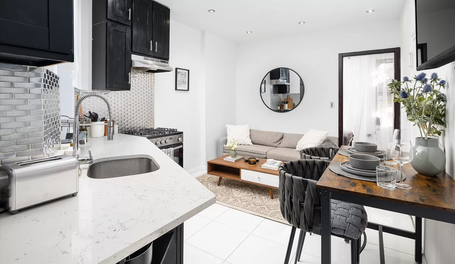 21 West 106th Street, Unit 4A Manhattan, NY 10025 - Photo 3 of 6 a bathroom with a sink and a mirror