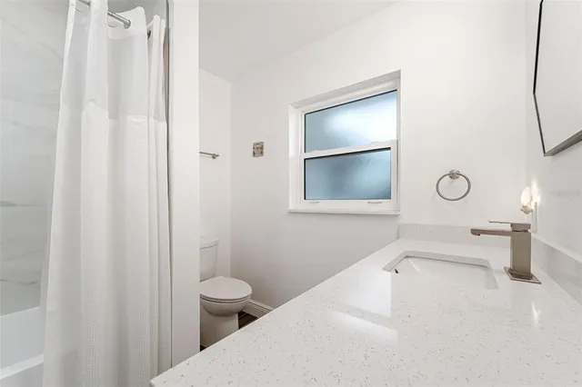 a view of a bathroom from a bathroom