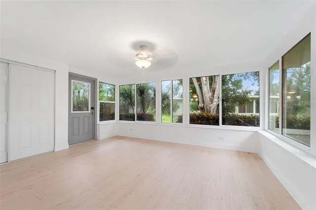 a view of an empty room with a large window