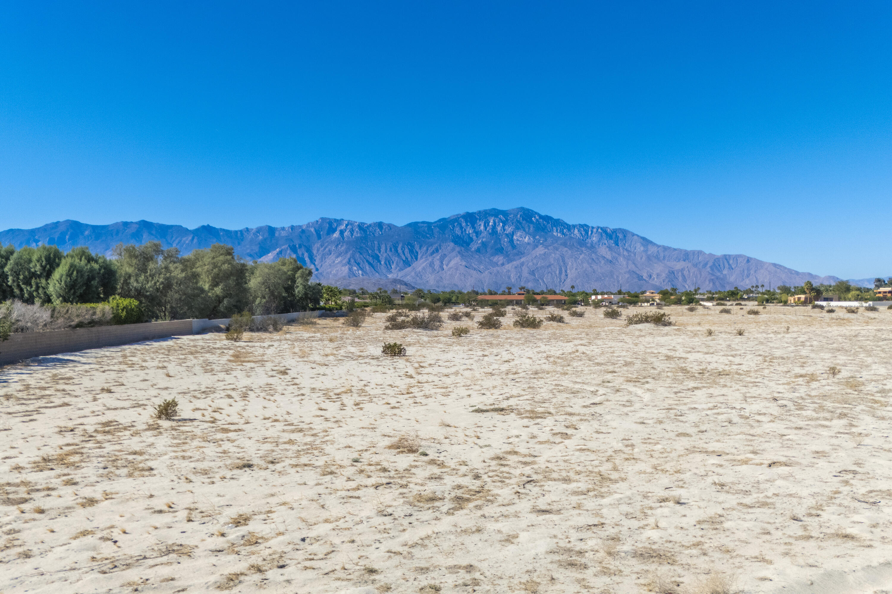 35335 Via Josefina Rancho Mirage, CA 92270 - Photo 10 of 24 a view of a dry yard with mountains in the background