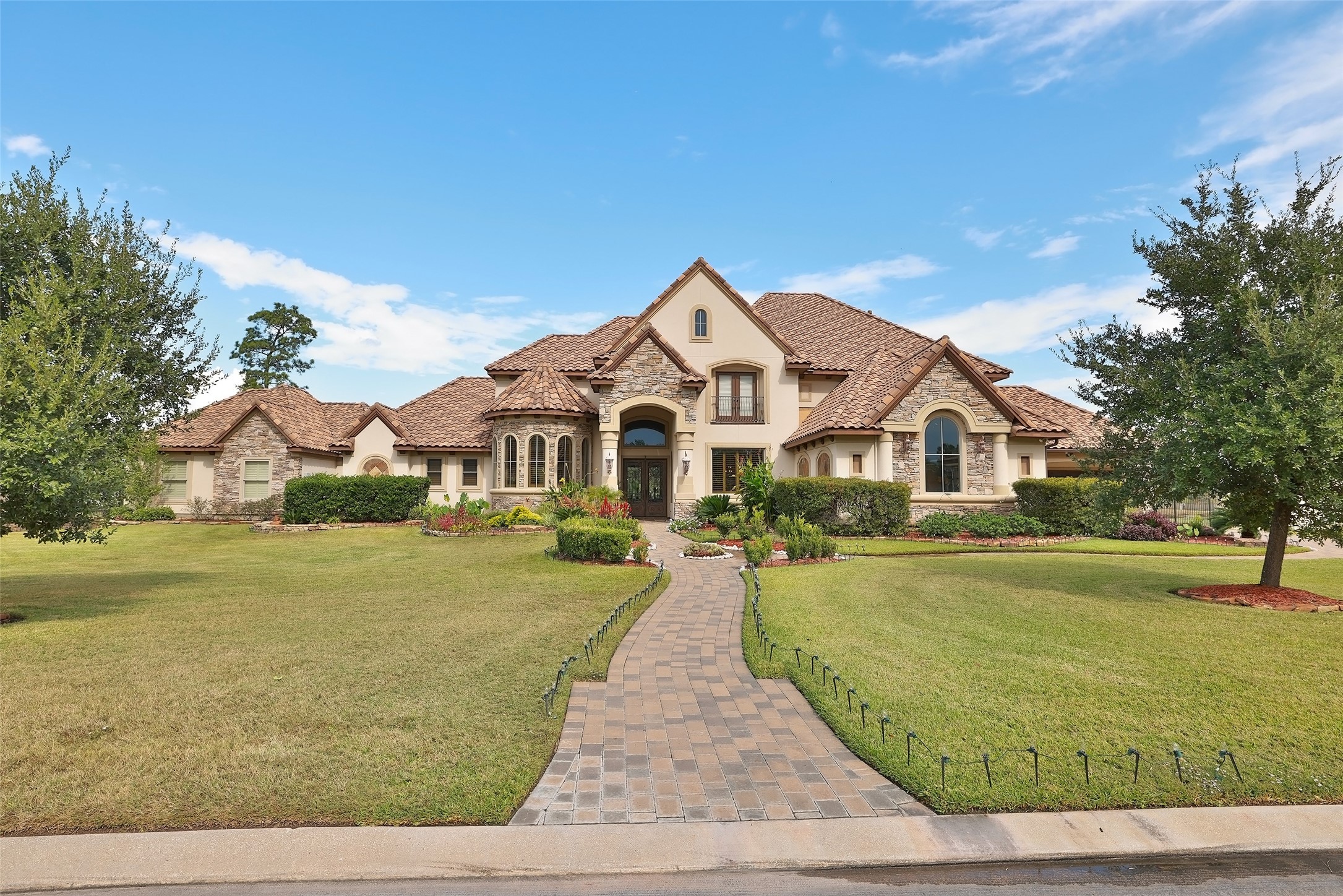 22 Post Shadow Estate Drive Spring, TX 77389 - Photo 5 of 50 a front view of a house with a yard
