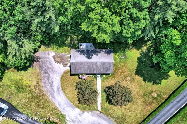 a aerial view of a house with a garden