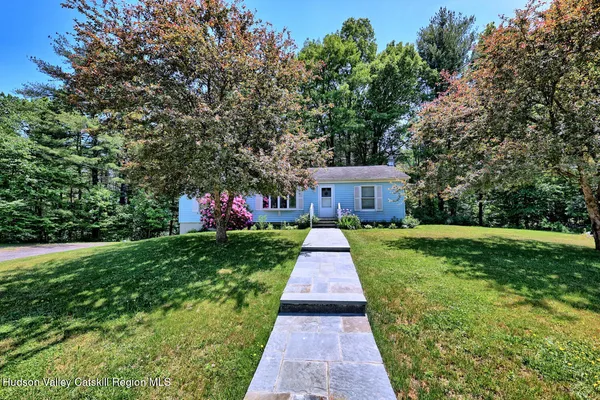 a bathroom with a sink a toilet and a bathtub