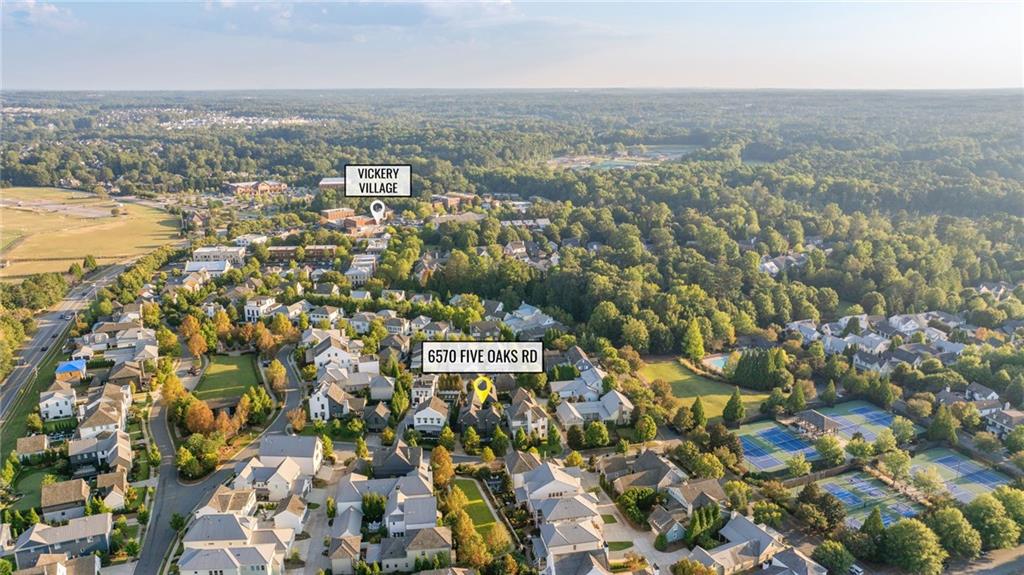 6570 Five Oaks Road Cumming, GA 30040 - Photo 110 of 136 an aerial view of residential building with parking space