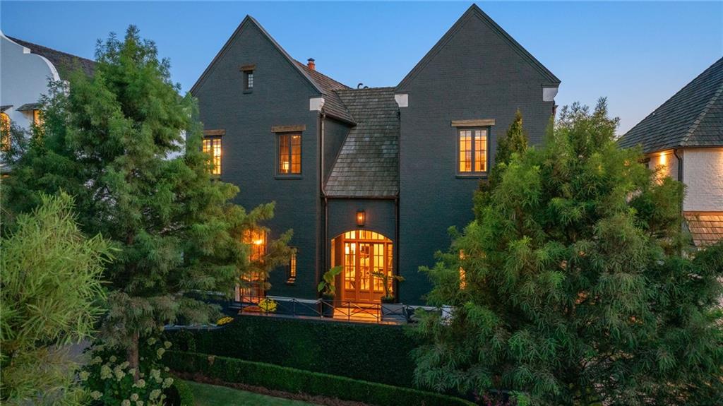 6570 Five Oaks Road Cumming, GA 30040 - Photo 15 of 136 a front view of a house with yard and green space