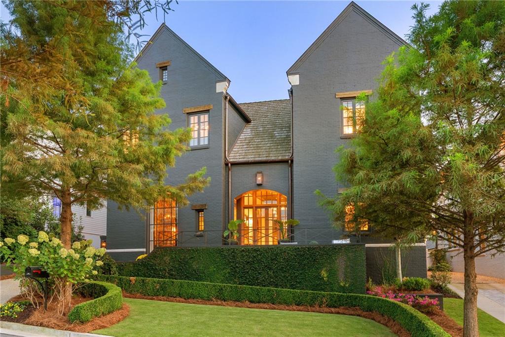 6570 Five Oaks Road Cumming, GA 30040 - Photo 16 of 136 a view of a house with a yard