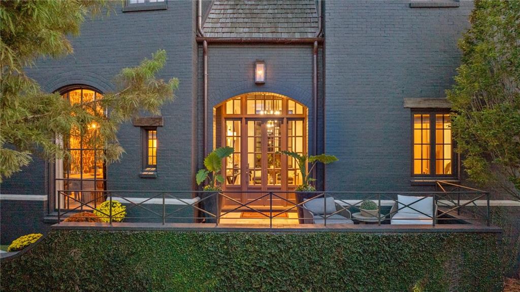 6570 Five Oaks Road Cumming, GA 30040 - Photo 19 of 136 a front view of a house with swimming pool and outdoor seating