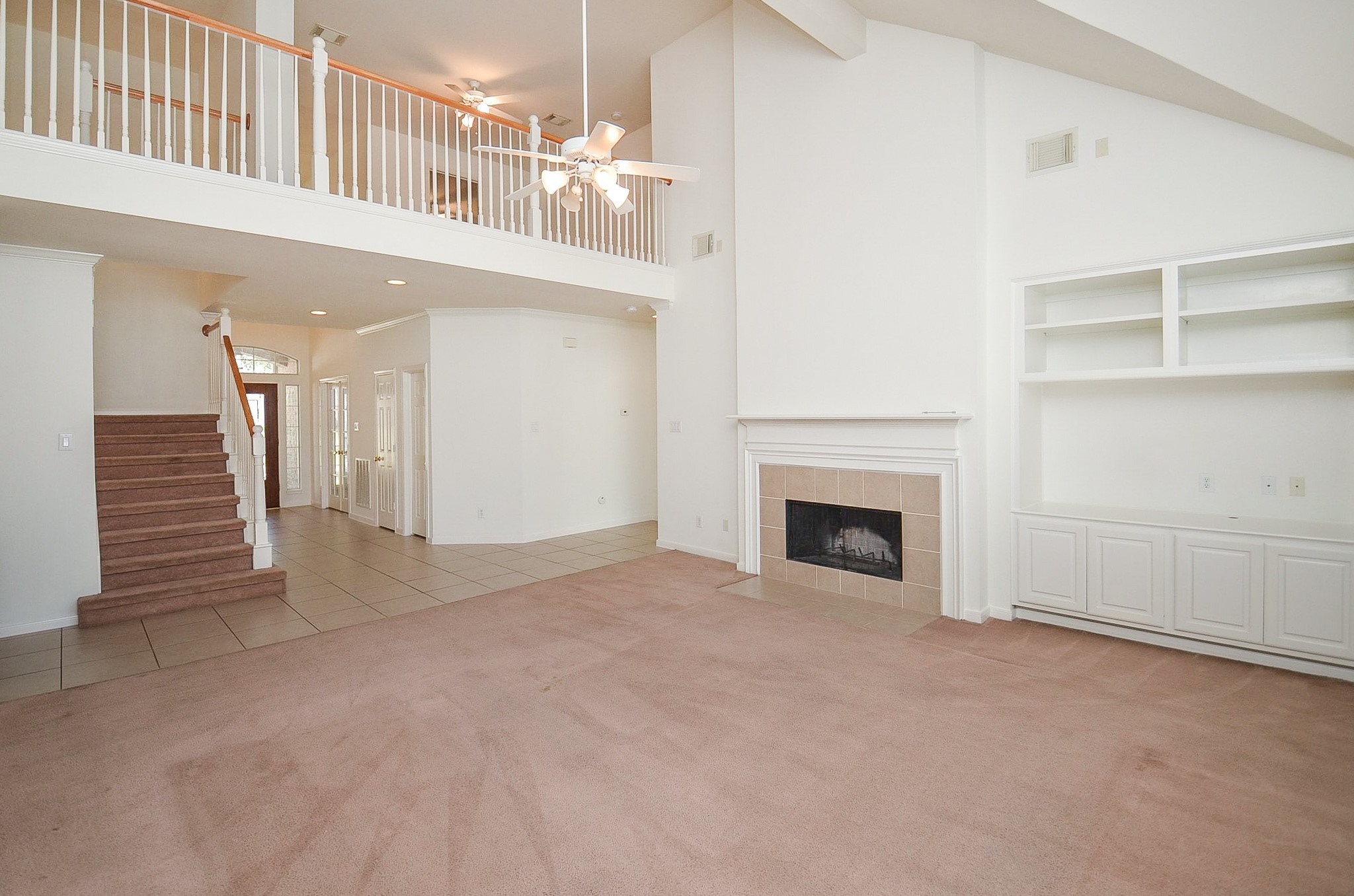 23615 Banning Point Court Katy, TX 77494 - Photo 15 of 50 a view of a livingroom with a fireplace