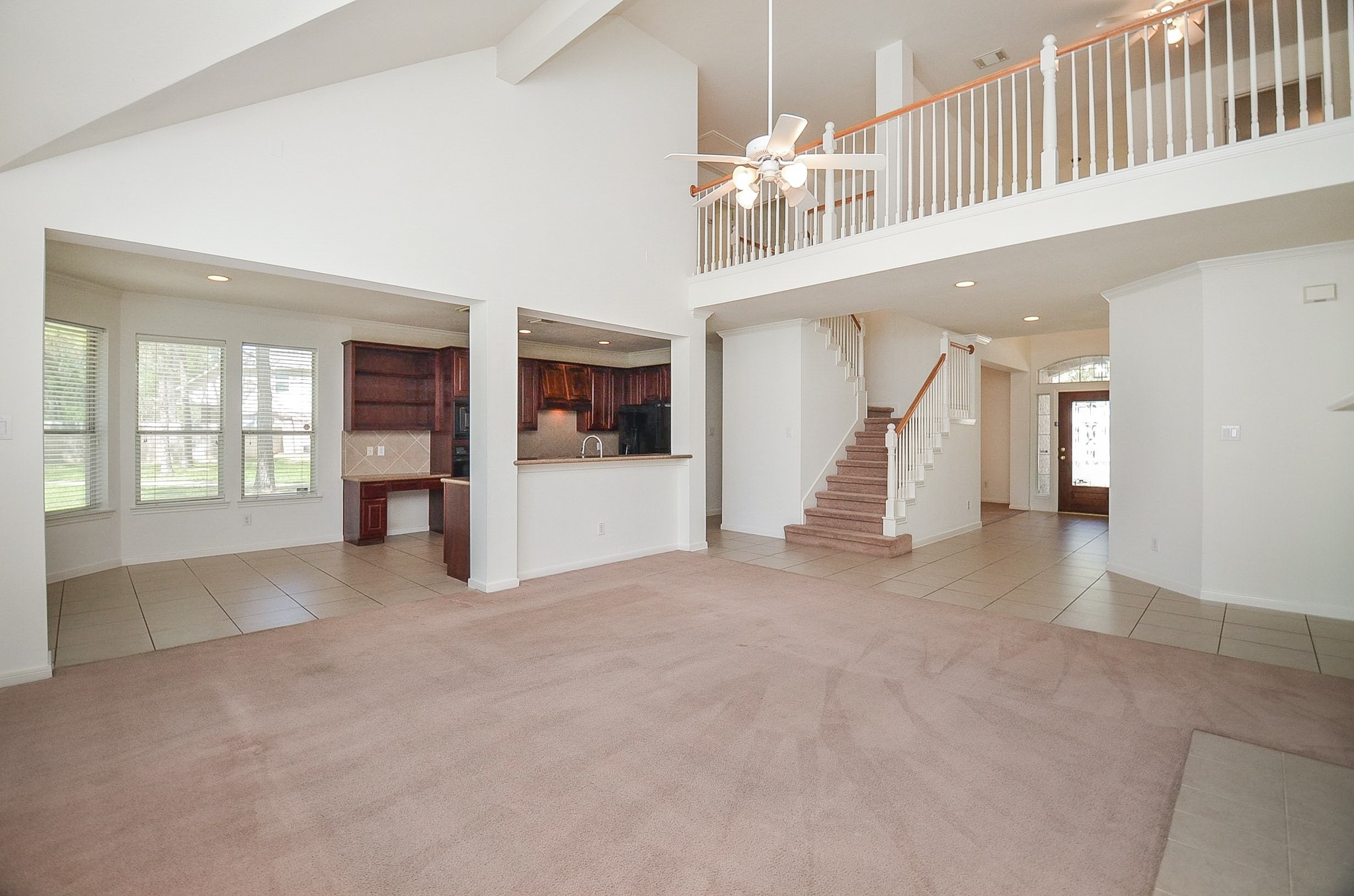 23615 Banning Point Court Katy, TX 77494 - Photo 16 of 50 en view interior of a house with stairs and a living room