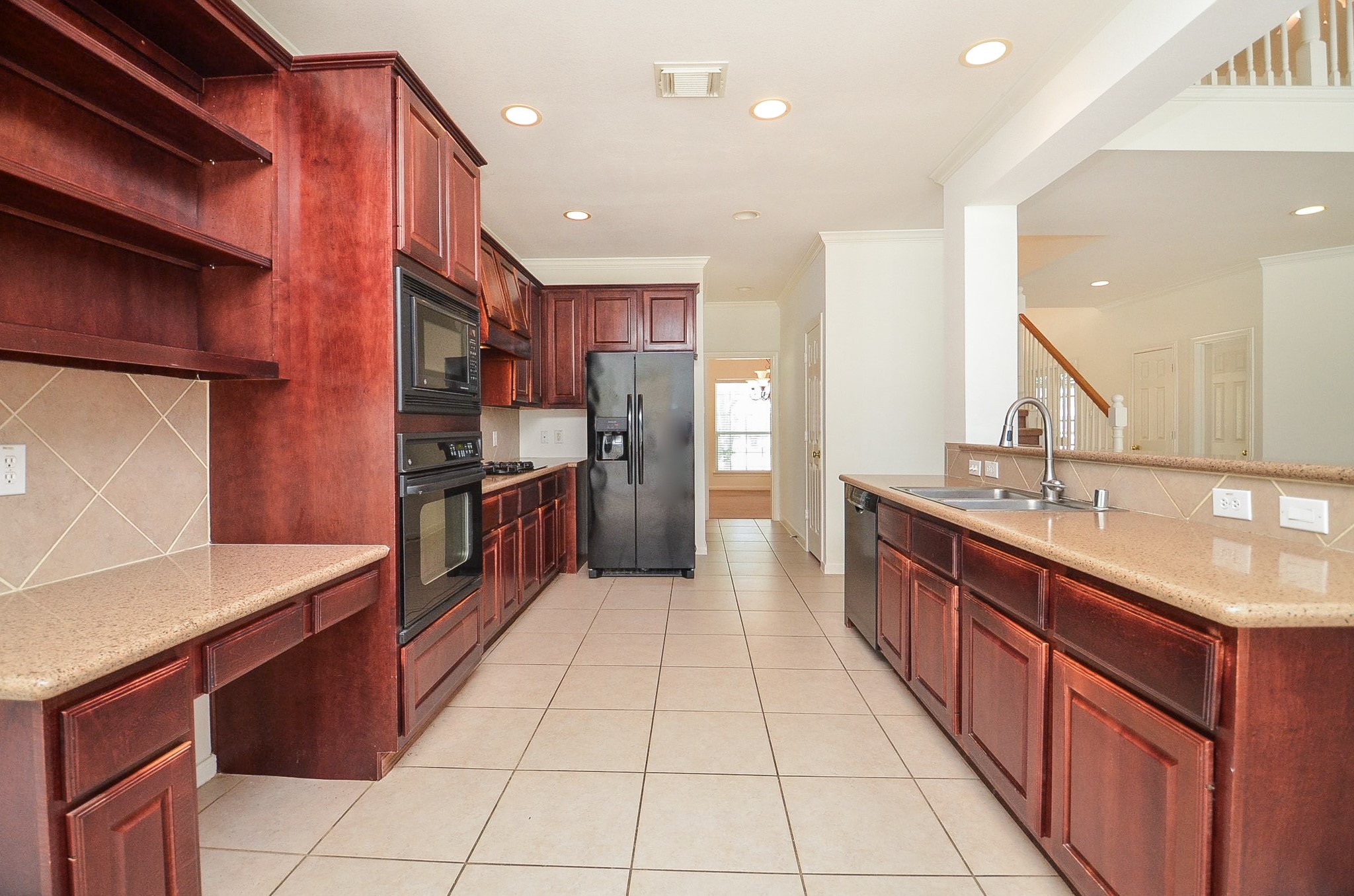 23615 Banning Point Court Katy, TX 77494 - Photo 18 of 50 a large kitchen with stainless steel appliances lots of counter top space