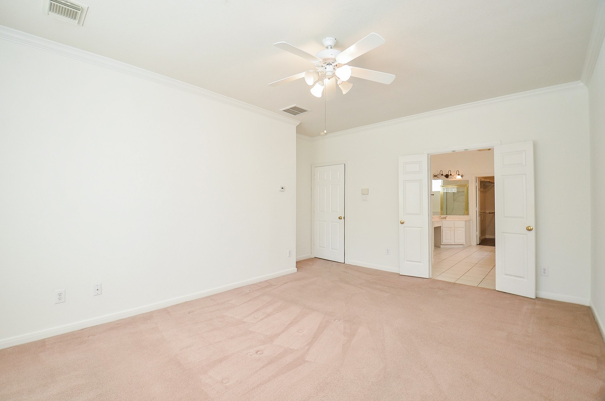 23615 Banning Point Court Katy, TX 77494 - Photo 28 of 50 a view of an empty room with a chandelier fan