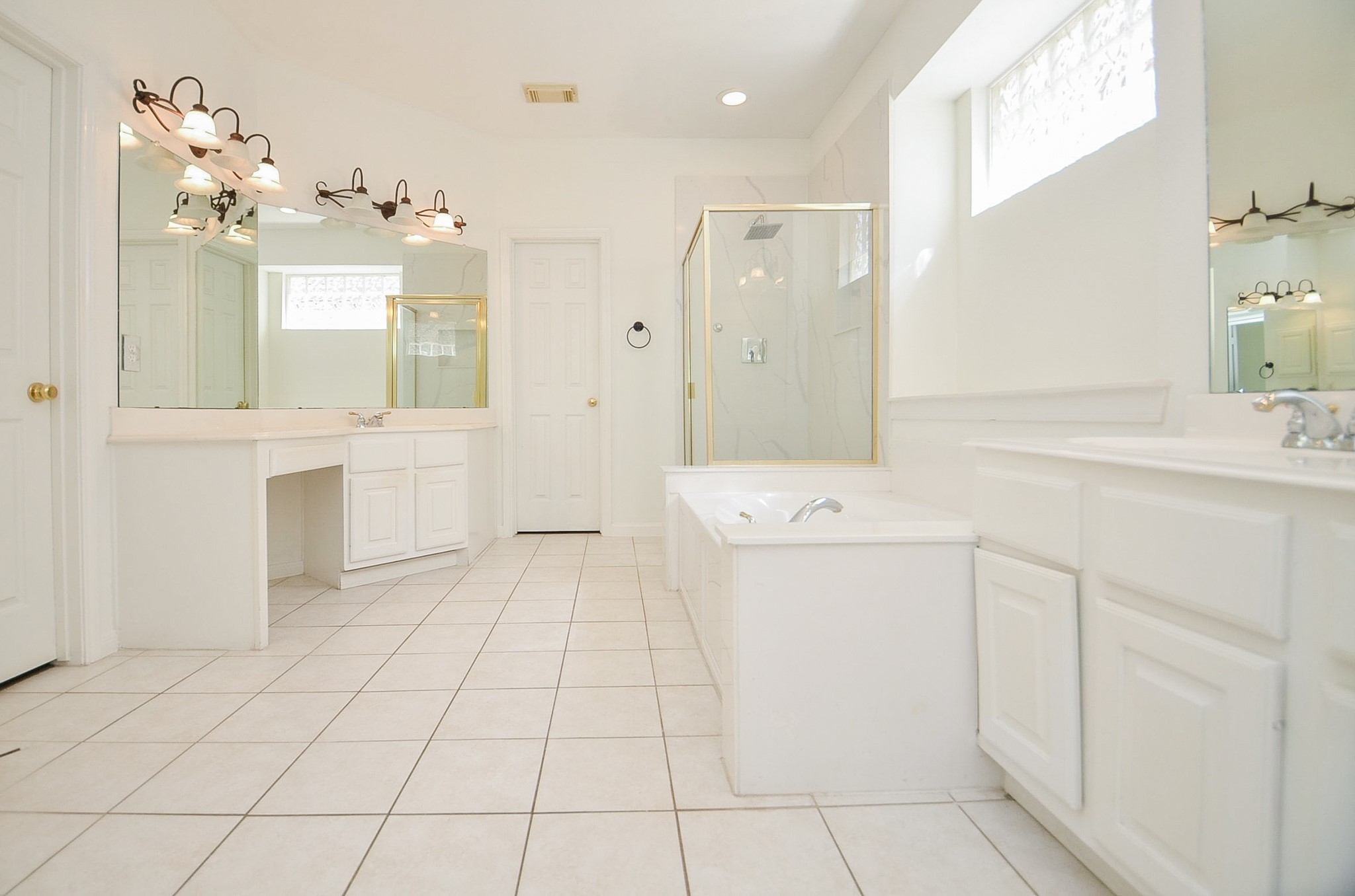 23615 Banning Point Court Katy, TX 77494 - Photo 29 of 50 a bathroom with a sink a toilet a mirror and shower