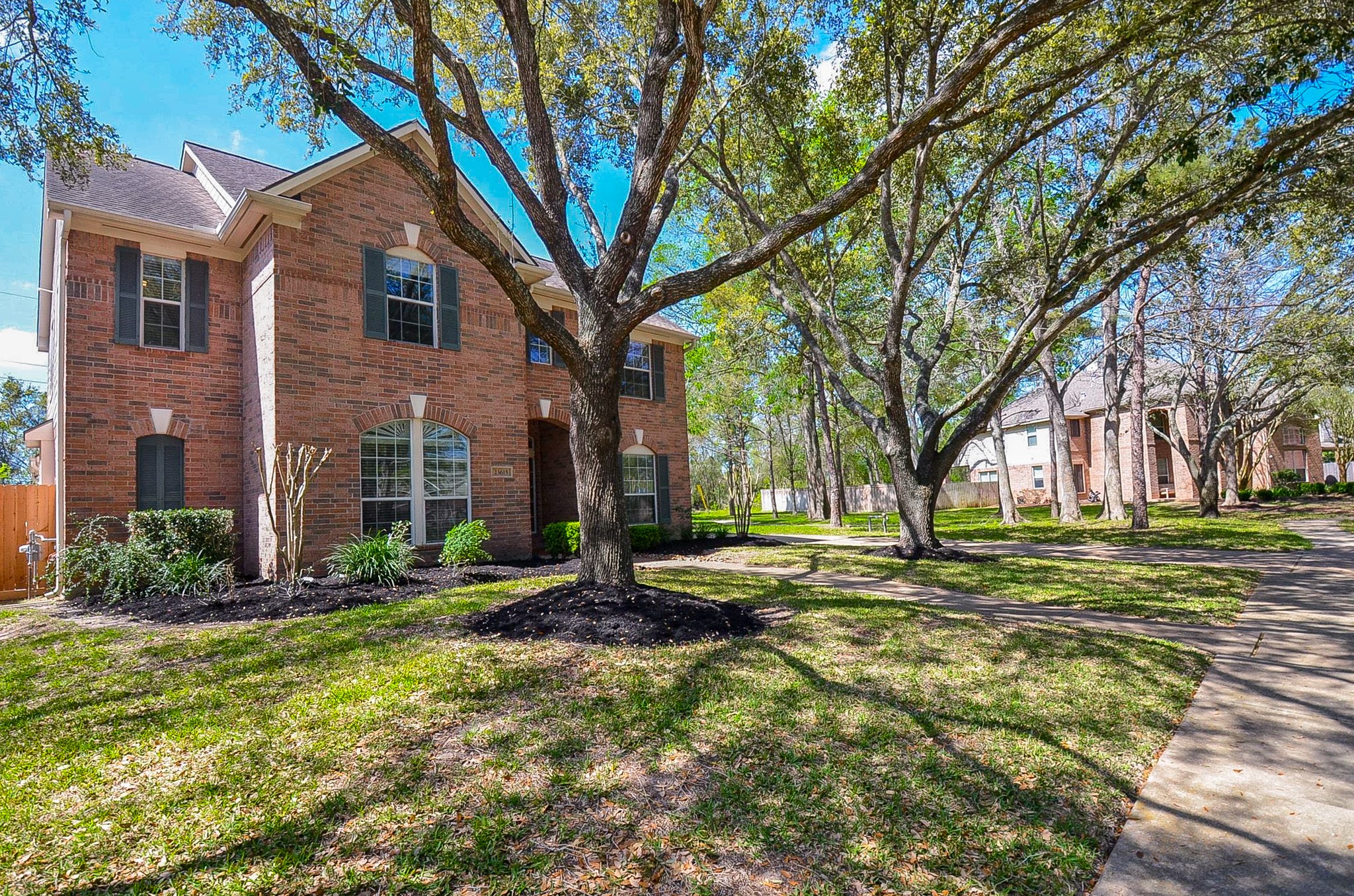 23615 Banning Point Court Katy, TX 77494 - Photo 3 of 50 a brick building with trees in front of it