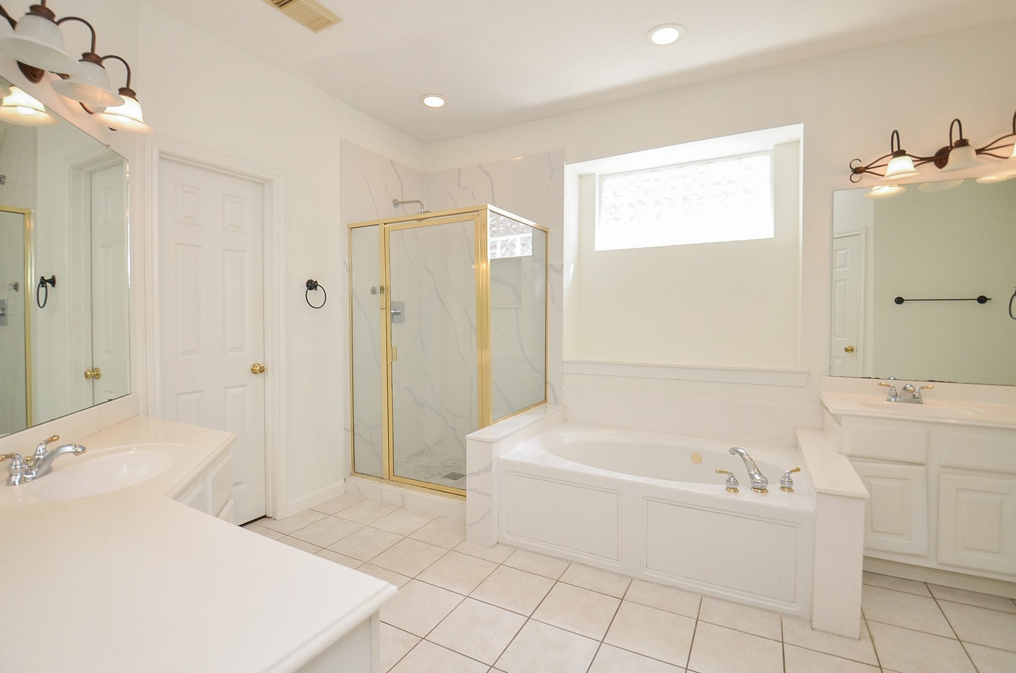 23615 Banning Point Court Katy, TX 77494 - Photo 31 of 50 a bathroom with a bathtub and a sink