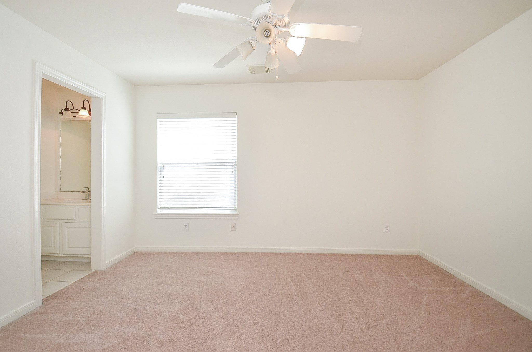 23615 Banning Point Court Katy, TX 77494 - Photo 37 of 50 an empty room with windows and fan