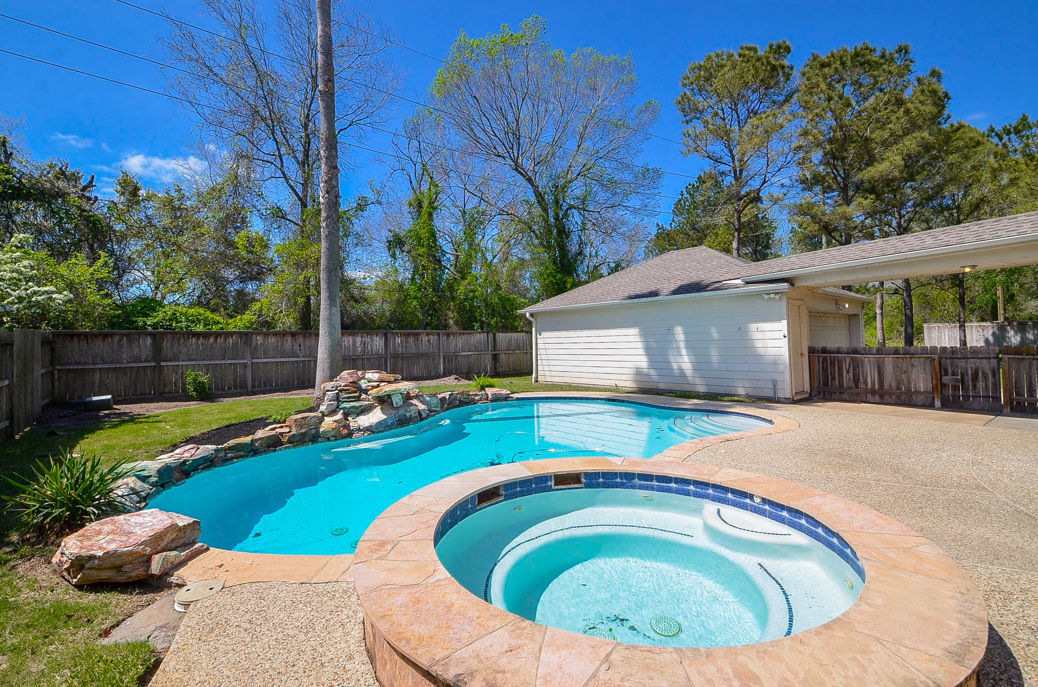 23615 Banning Point Court Katy, TX 77494 - Photo 43 of 50 a view of swimming pool with a garden