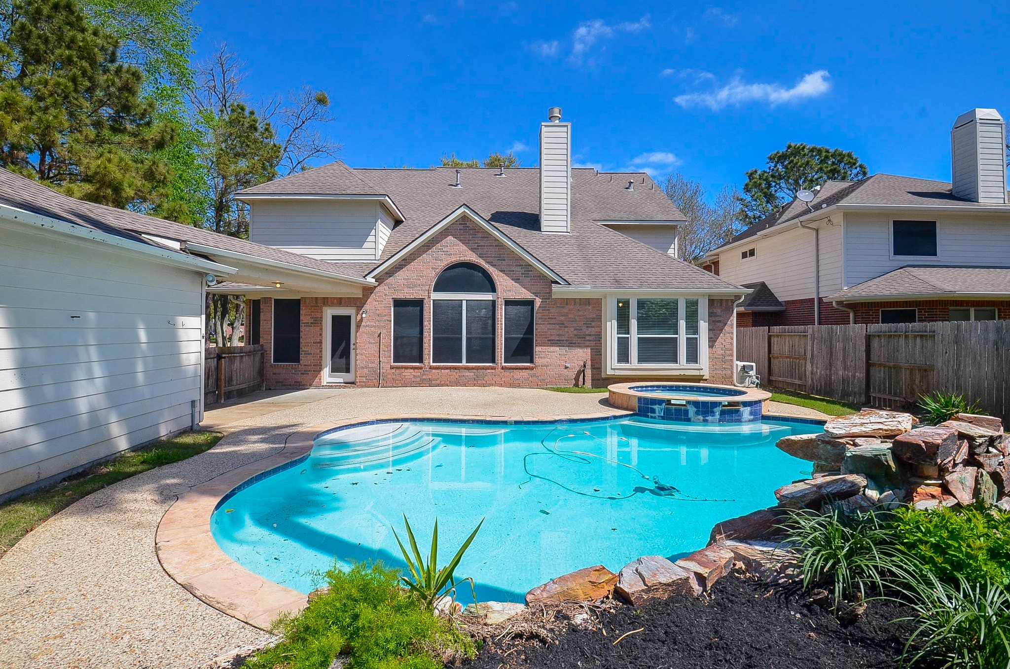 23615 Banning Point Court Katy, TX 77494 - Photo 45 of 50 a view of a house with pool and chairs