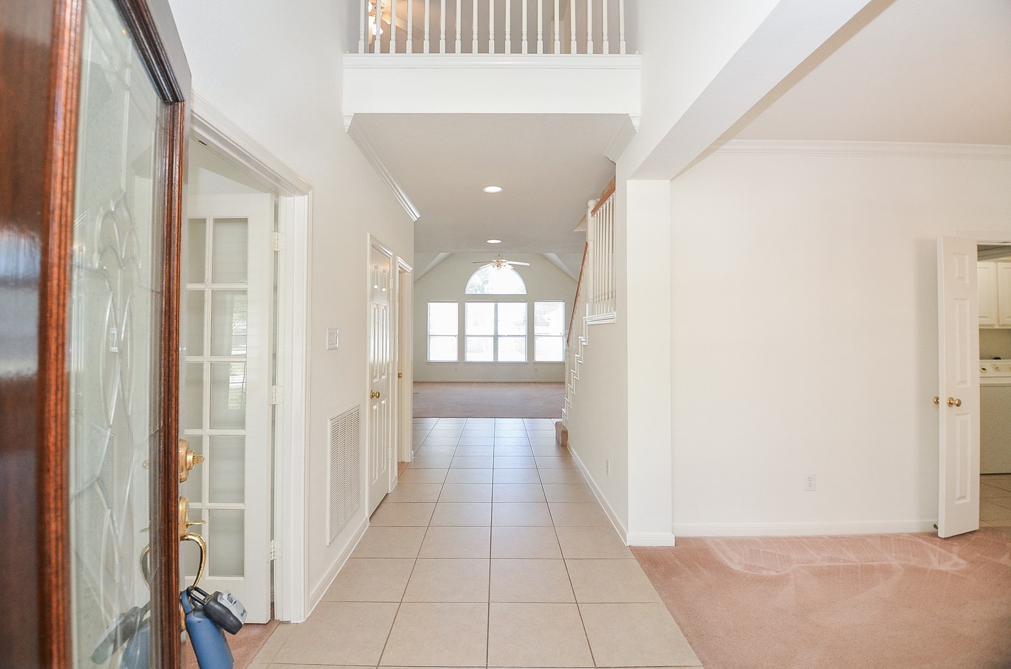23615 Banning Point Court Katy, TX 77494 - Photo 7 of 50 a view of a hallway with a chandelier