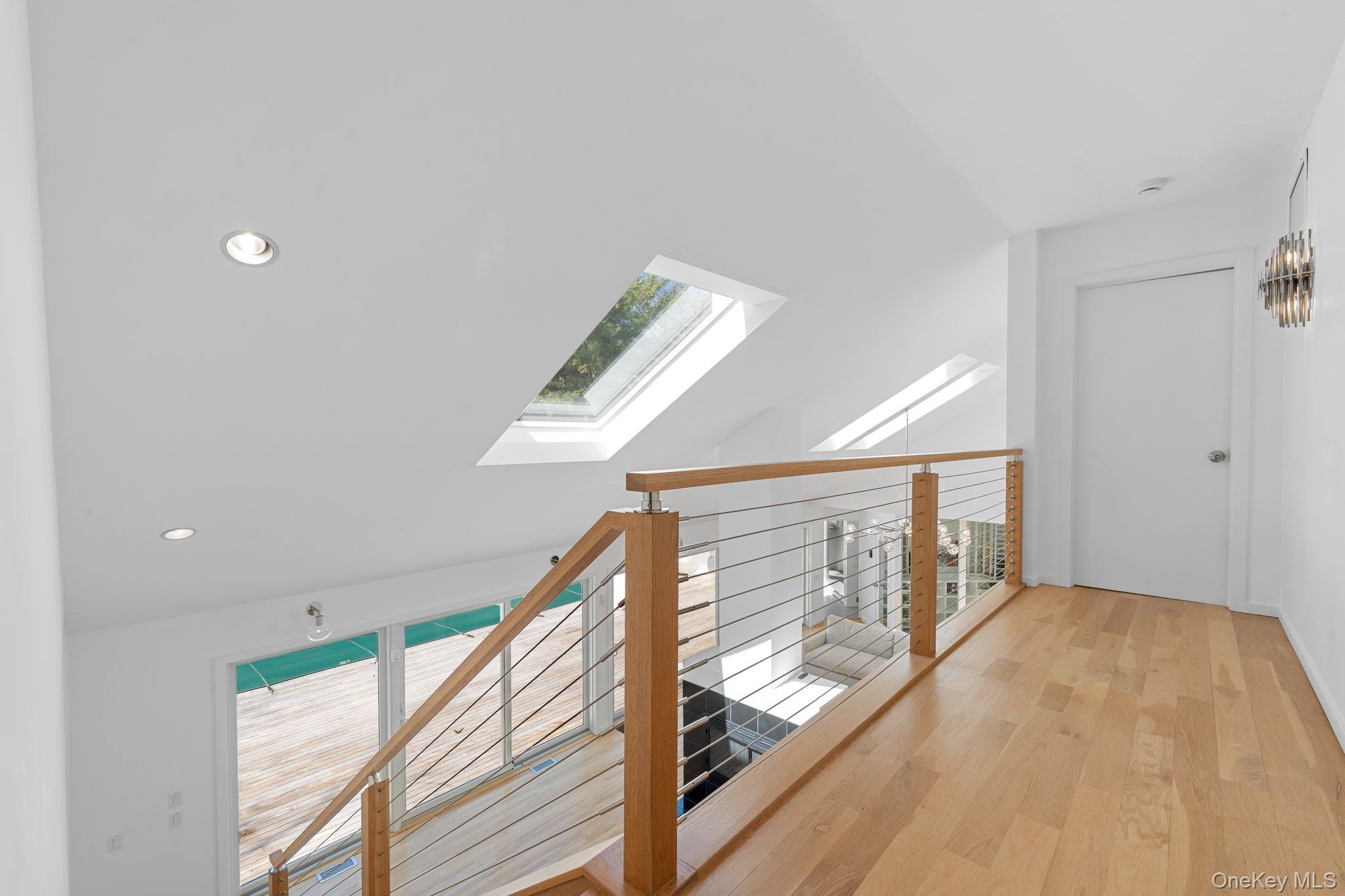 35 Ely Brook Road East Hampton, NY 11937 - Photo 14 of 32 a view of entryway and hall with wooden floor