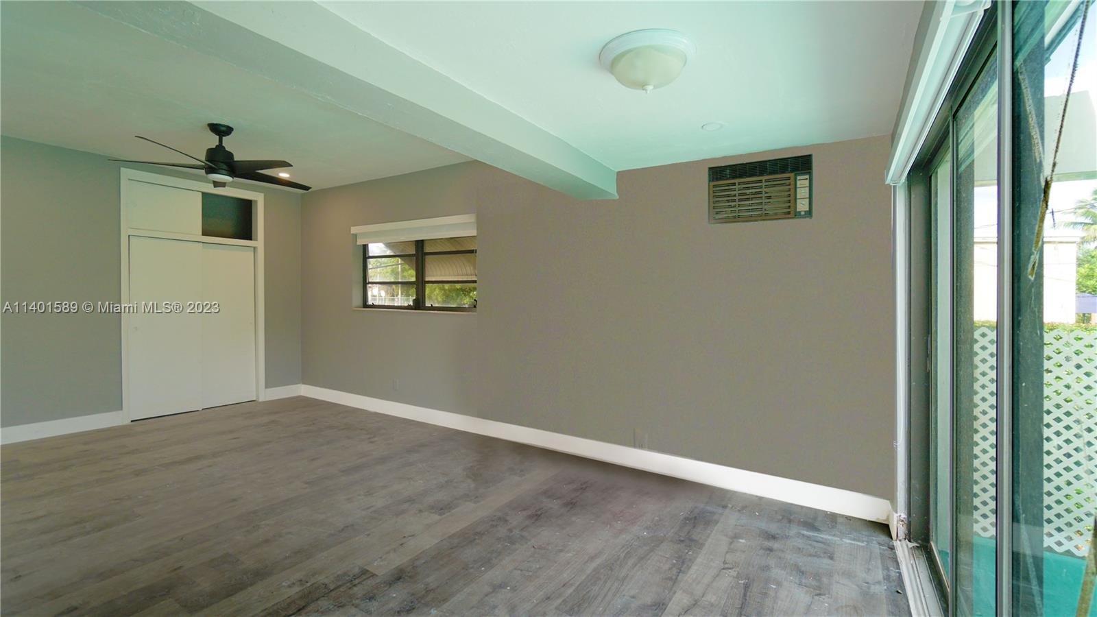 8480 Southwest 32nd Street Miami, FL 33155 - Photo 17 of 24 an empty room that has a window