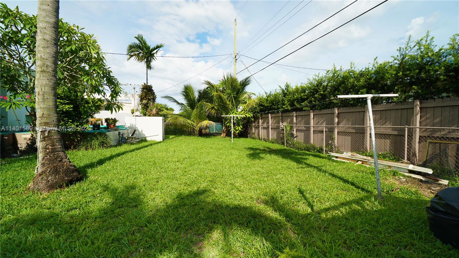 8480 Southwest 32nd Street Miami, FL 33155 - Photo 18 of 24 a view of yard with swimming pool and green space