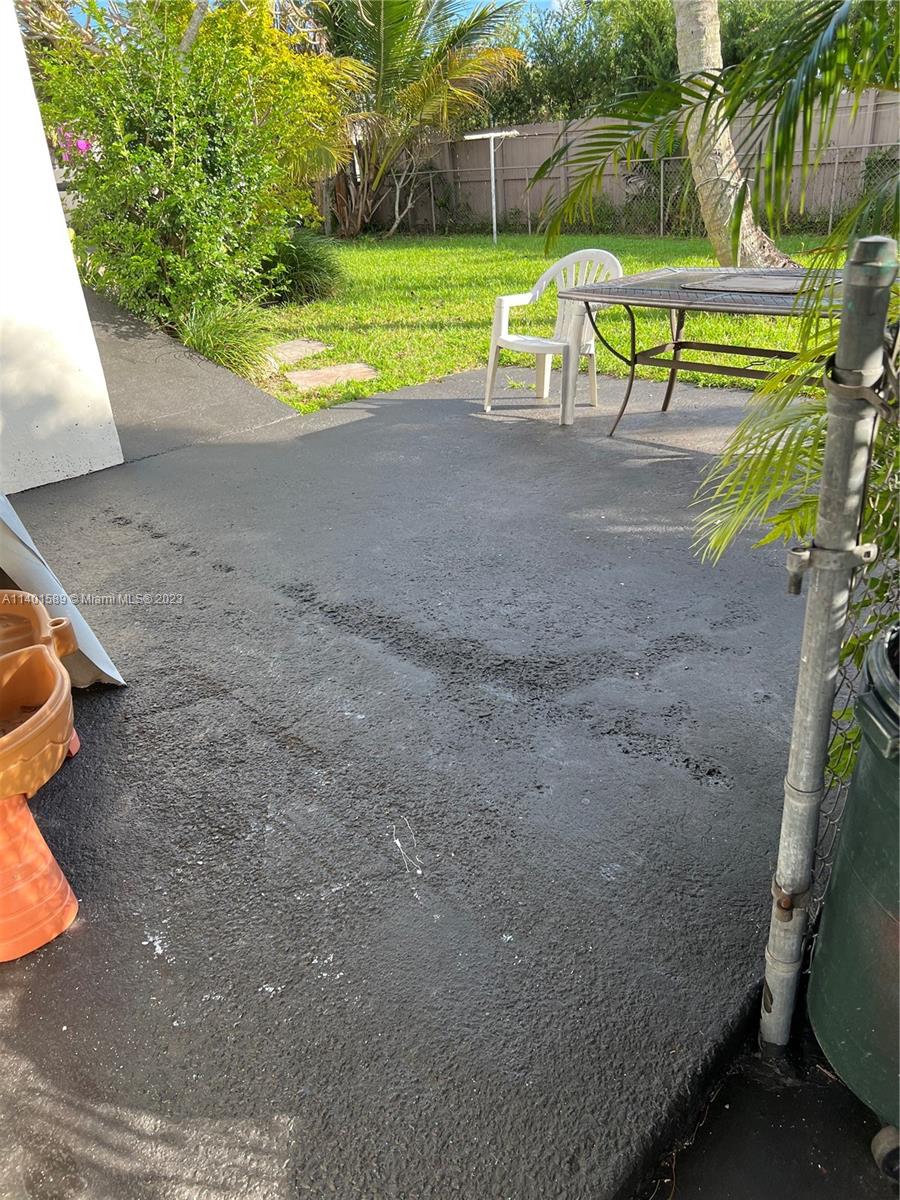 8480 Southwest 32nd Street Miami, FL 33155 - Photo 22 of 24 a view of yard with swimming pool and lawn chairs