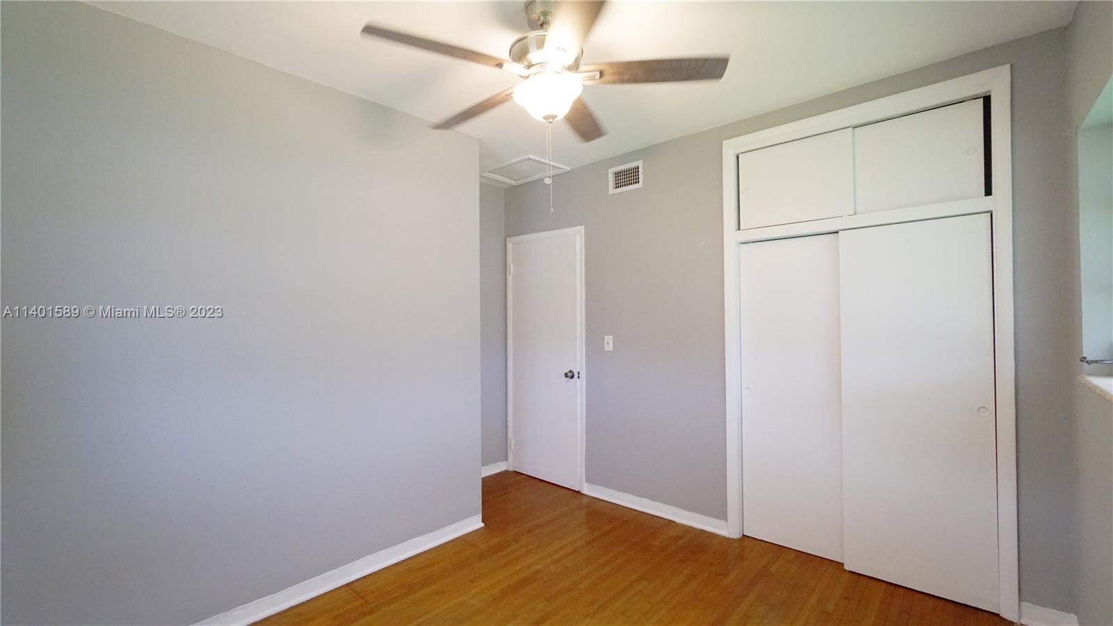 8480 Southwest 32nd Street Miami, FL 33155 - Photo 9 of 24 a view of empty room with ceiling fan