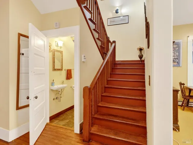 a view of livingroom with furniture and staircase