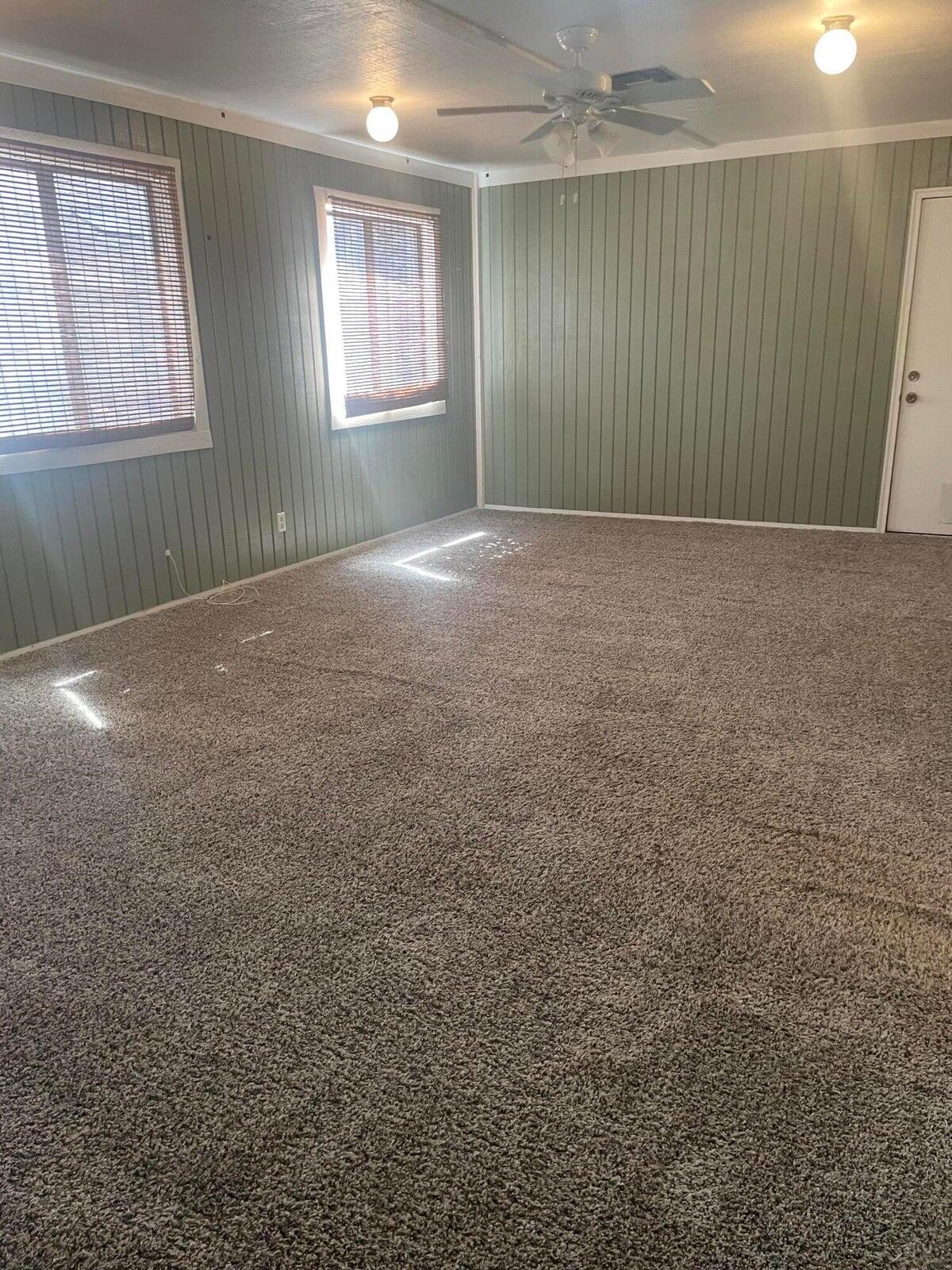 1105 Sean Lane Niceville, FL 32578 - Photo 11 of 16 an empty room with windows