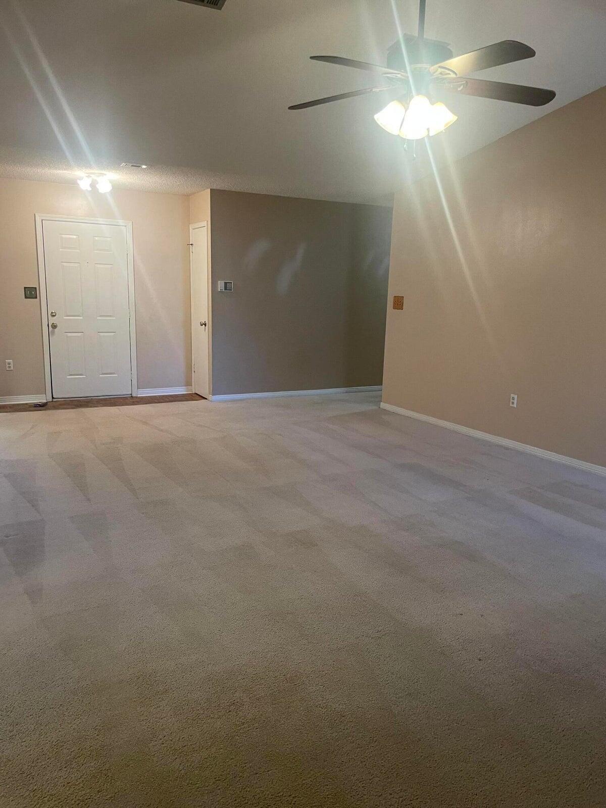 1105 Sean Lane Niceville, FL 32578 - Photo 8 of 16 a view of an empty room with a chandelier fan