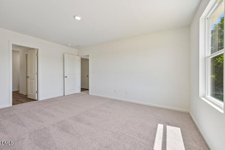 10955 Lancaster Store Road Castalia, NC 27816 - Photo 20 of 20 an empty room with windows
