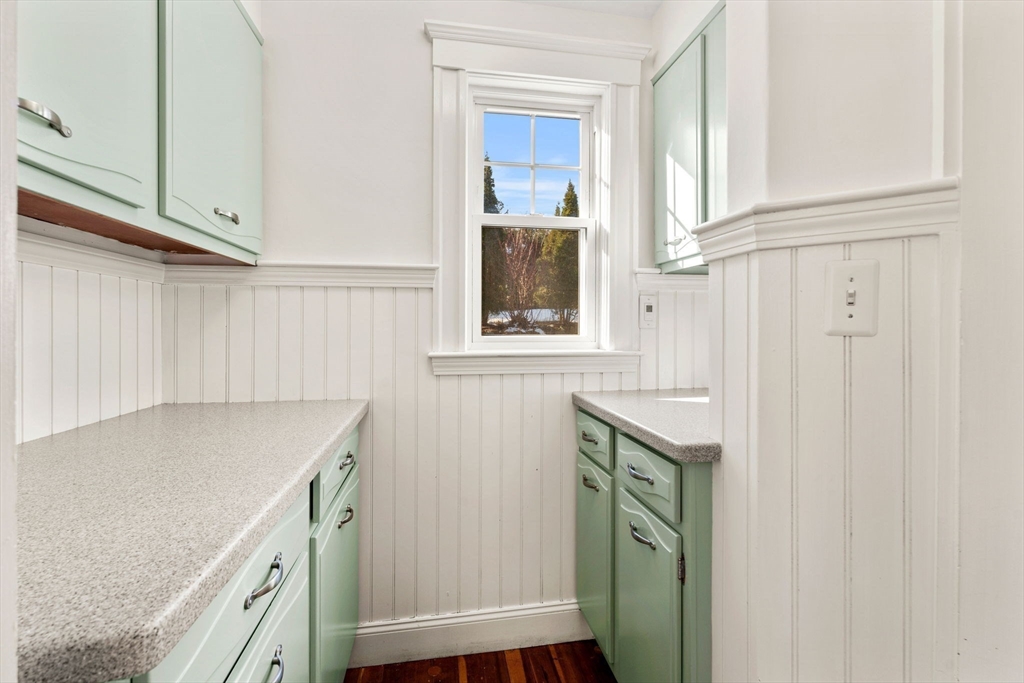27 Hawthorn Road Milton, MA 02186 - Photo 11 of 26 a kitchen with a sink and a window