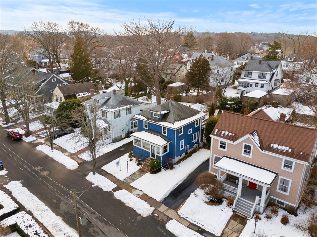 27 Hawthorn Road Milton, MA 02186 - Photo 25 of 26 an aerial view of a house with a mountain view