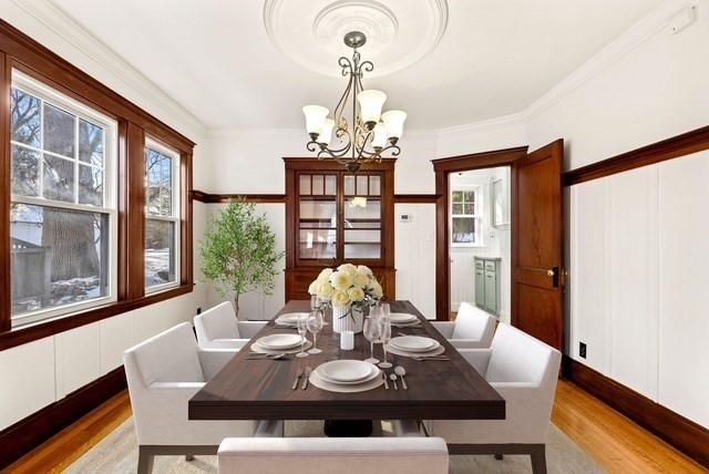 27 Hawthorn Road Milton, MA 02186 - Photo 6 of 26 a view of a dining room with furniture wooden floor and chandelier