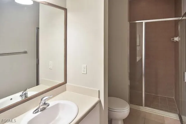 a bathroom with a sink and toilet
