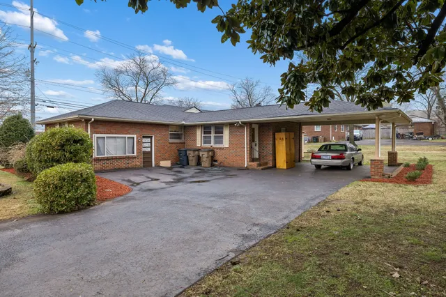 a car parked in front of a house
