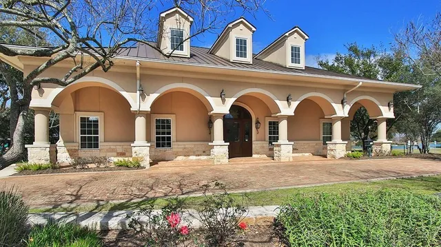 a view of swimming pool with a yard