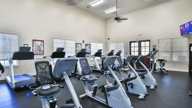 an aerial view of residential house with outdoor space and parking