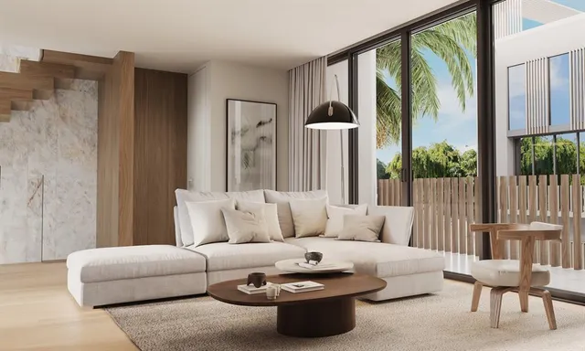 a living room with furniture and a large window