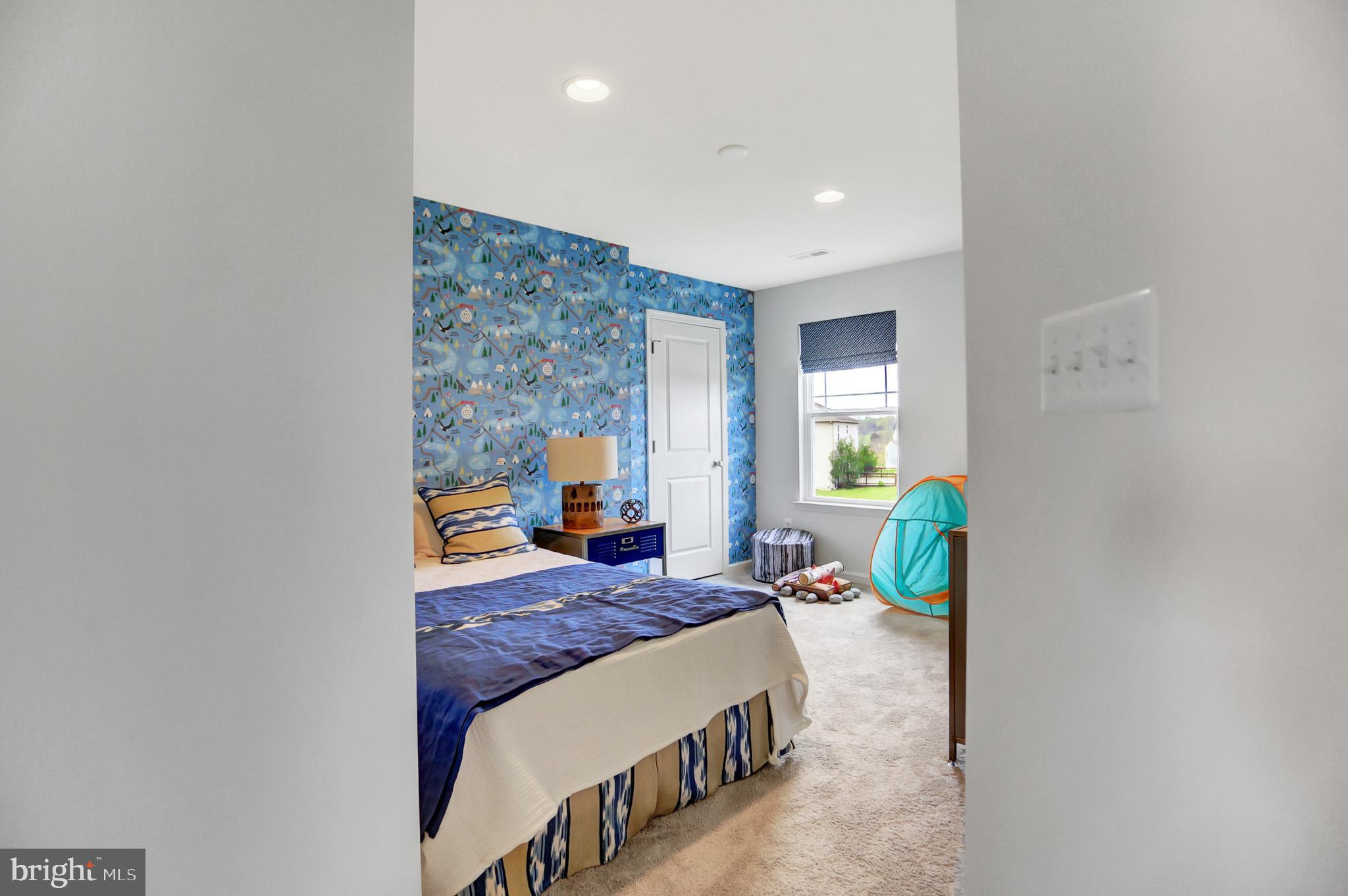 104 Singer Road Abingdon, MD 21009 - Photo 5 of 22 a bedroom with a bed window and wall painting