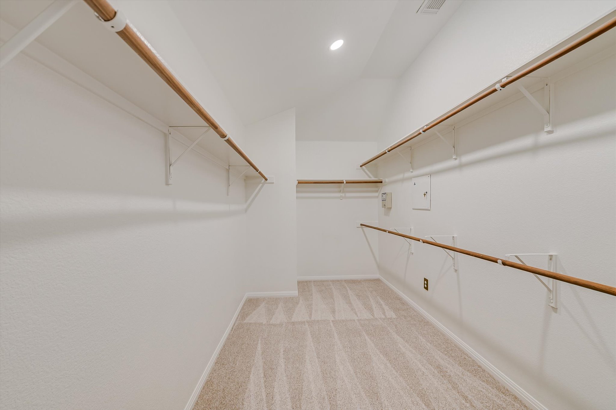 2849 Grimes Ranch Road Austin, TX 78732 - Photo 19 of 31 A spacious walk-in closet offers abundant storage and easy organization.