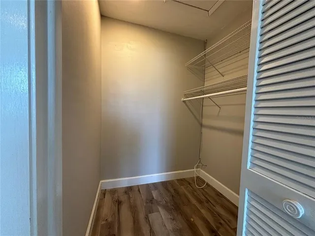 a view of room with walk in closet