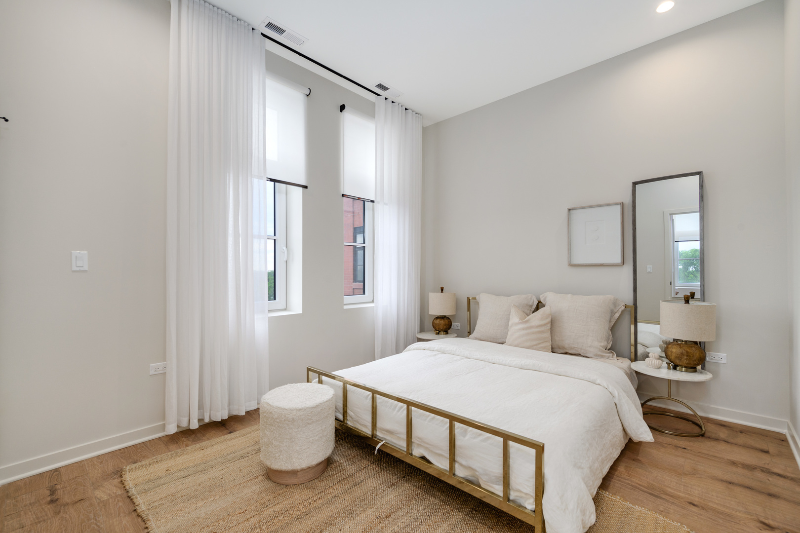 11 West Prospect Avenue, Unit 415 Mount Prospect, IL 60056 - Photo 13 of 62 a bedroom with a white bed and white walls